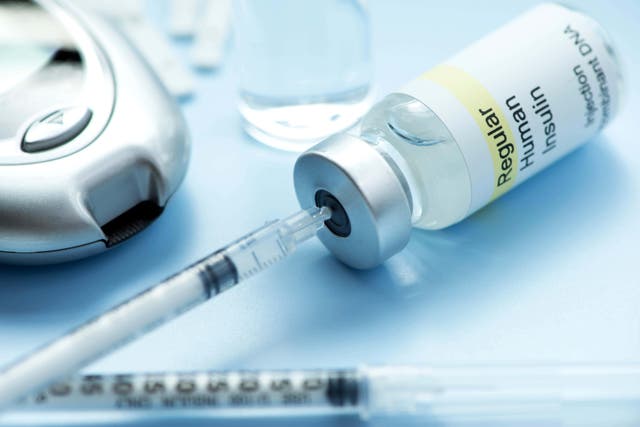 An insulin syringe draws insulin from insulin vial with glaucometer. A new drug targeting type 1 diabetes has been given the go ahead in the US (Alamy/PA)