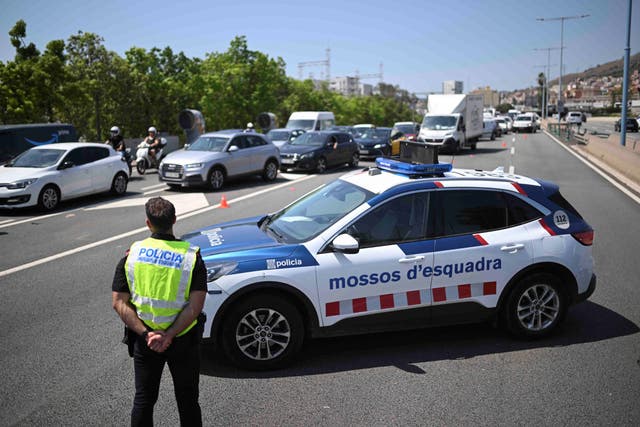 <p>Representative: A police officer at work in Spain</p>