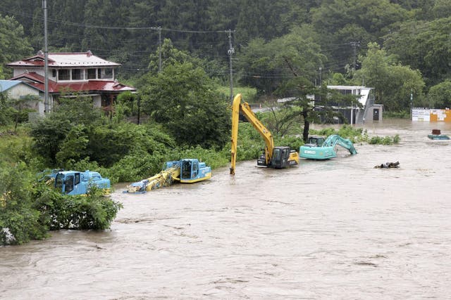 <p>File. Roads are flooded after storm Maria makes landfall in Iwate prefecture of Japan </p>