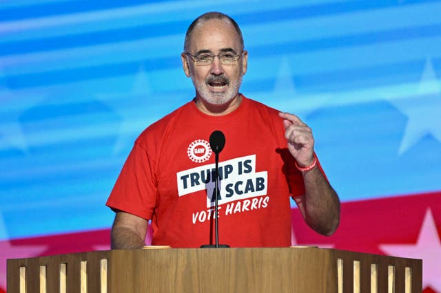 <p>United Auto Workers president Shawn Fain speaks to the Democratic National Convention on August 19</p>