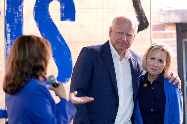 <p>Kamala Harris, the Democratic presidential nominee and vice president, addresses Democratic vice presidential nominee Tim Walz, governor of Minnesota, and his wife Gwen Walz at a campaign event in Rochester, Pennsylvania </p>