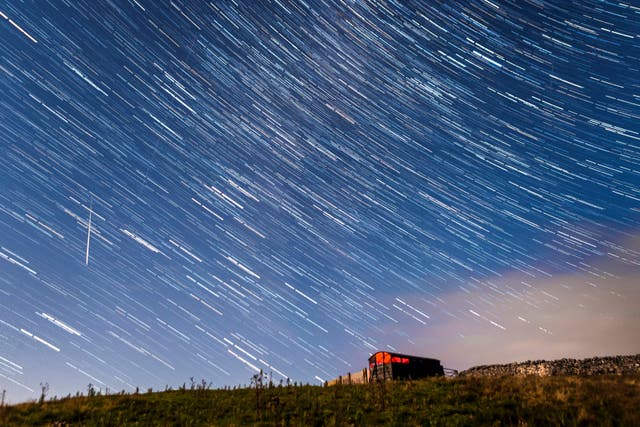 <p>The event is associated with the dusty debris left by Comet Swift-Tuttle, which orbits the sun once every 133 years (Danny Lawson/PA)</p>