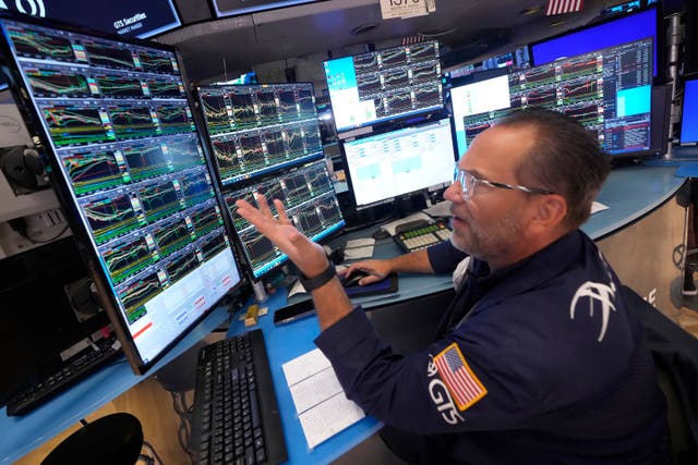 <p>Specialist Anthony Matesic works on the floor of the New York Stock Exchange, Monday, July 22, 2024</p>