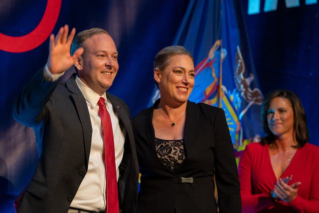 <p>Alison Esposito (center) at an election night party on November 8, 2022 in New York City with running mate, Republican gubernatorial candidate Lee Zeldin. Her campaign has rejected claims she once detained an infant when she worked as a police officer </p>