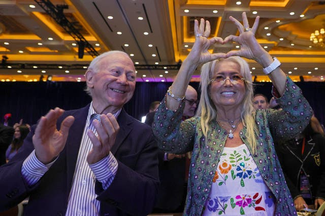 <p>Miriam Adelson makes a heart symbol as Republican presidential candidate Donald Trump is introduced at the Republican Jewish Coalition’s Annual Leadership Summit at The Venetian Resort Las Vegas on October 28, 2023 </p>