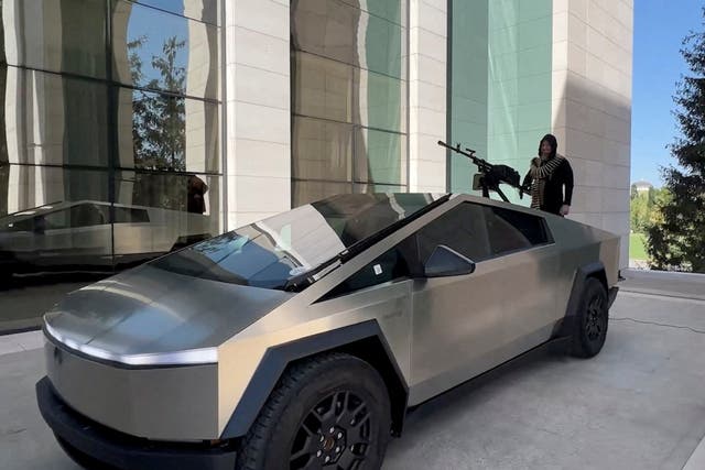 <p>Leader of Russia’s Chechnya region Ramzan Kadyrov is seen atop what is said to be a Tesla Cybertruck equipped with a machine gun, in Grozny, Russia, in this still image from video published August 17, 2024</p>