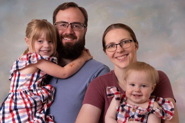 <p>Nathan Morris, 35, with his wife and children. Morris was shot and killed by his neighbor, Devereaux Christopher Johnson, on August 10, 2024 near his home in Canton, Michigan. The shooting occurred after Johnson allegedly accused Morris’s daughter of touching his mulch</p>