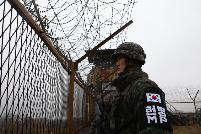 <p>File: A South Korean soldier looks at North Korea at a border guard post</p>