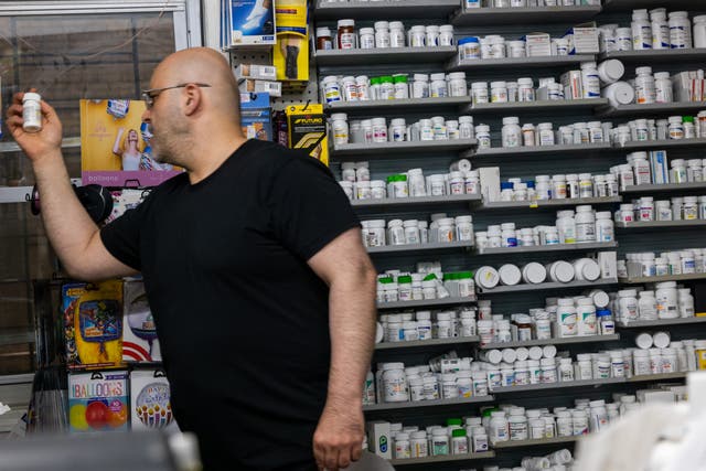 <p>A pharmacist works at a NYC Discount Pharmacy in Manhattan on July 23, 2024 in New York City</p>