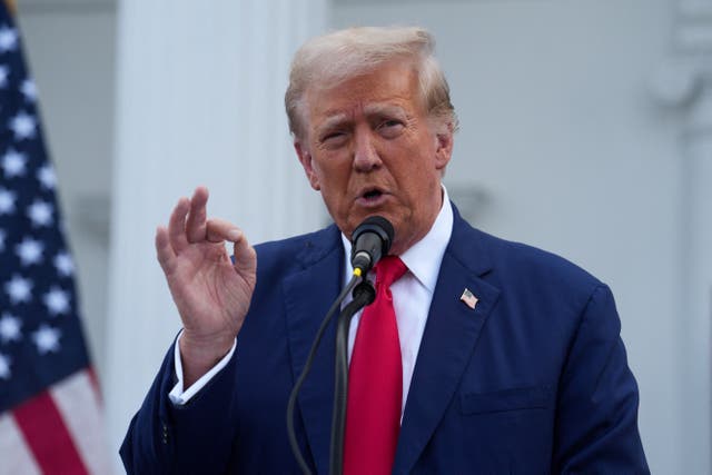 <p>Donald Trump speaks outside of his New Jersey golf club on August 15 </p>