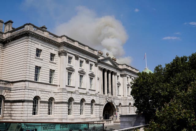 <p>Smoke rises out of Somerset House after a fire broke out  </p>