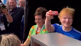 Ed Sheeran dishes up pies to fans at Ipswich Town match 