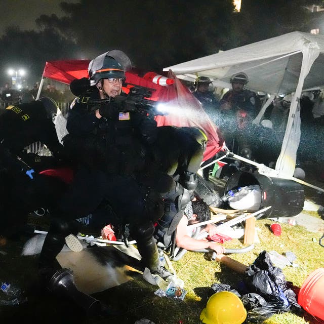 <p>Police advance on pro-Palestinian demonstrators in an encampment on the UCLA campus, May 2, 2024, in Los Angeles</p>